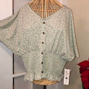 Orange Kiss mint green floral blouse. NWT